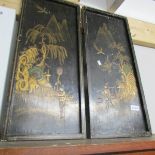 A pair of lacquered panels.