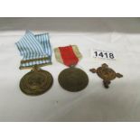 A United Nations Korean medal, St. John Ambulance dedicated medal and 1914-18 S.A Medal.
