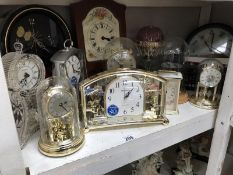 A collection of aniversary & other clocks plus a thimble display dome