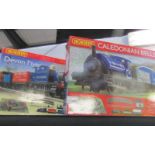 2 Hornby 'oo' gauge train sets - R1121 and R1151 (Devon Flyer and Caledonian Belle).