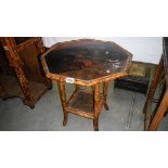 An octagonal bamboo occasional table.