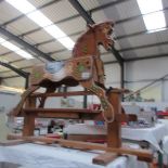 A small rocking horse.