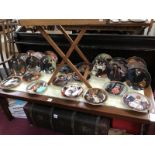 A collection of Knowles collectors plates with certificates - 13 Rockwell heritage collection,