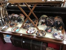 A collection of Knowles collectors plates with certificates - 13 Rockwell heritage collection,