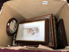 A box of framed and glazed pictures