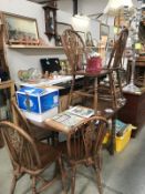 An oval extending table and 6 chairs