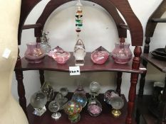 2 shelves of glass paperweights