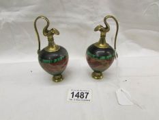 A pair of miniature brass and stone ewers, approximately 5" tall.