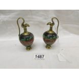 A pair of miniature brass and stone ewers, approximately 5" tall.