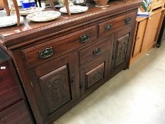 A carved and decorative sideboard