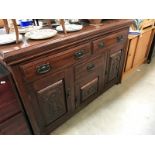 A carved and decorative sideboard