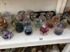 A good collection of 16 glass paperweights