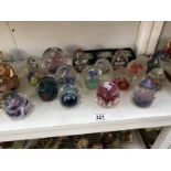 A good collection of 16 glass paperweights