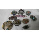 A mixed lot of brooches including Scottish.