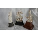 3 items of 1920's ivory tourist ware on rosewood bases.