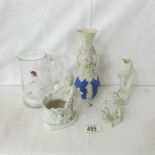 A Mary Gregory jug and 4 bisque porcelain items.