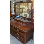 A mahogany inlaid dressing table.