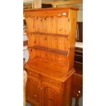 A small pine dresser.