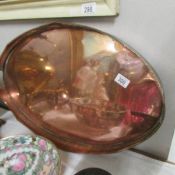 A large copper gallery tray.