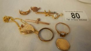 A quantity of scrap gold including 22ct gold ring, brooch etc. Total weight approximately 15 grams.