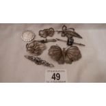 8 vintage silver brooches, all in good condition.