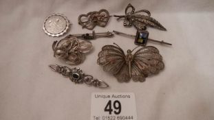 8 vintage silver brooches, all in good condition.