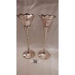 A pair of hall marked silver spill vases in good condition, 6.25" tall.