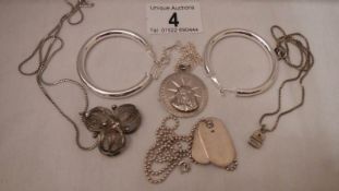 4 silver necklaces and silver earrings, approximately 42 grams.