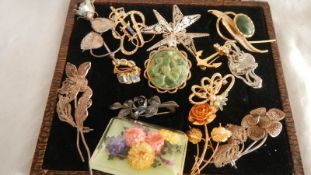 A mixed lot of costume jewellery including some silver.