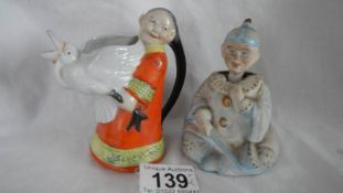 A rare Chinese nodding figure and a Chinese water jug, in good condition.