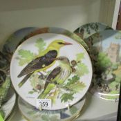 Approximately 15 collector's plates including WWF birds.