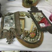 A painted gypsy mirror and 2 metal framed mirrors.