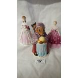 A Royal Worcester figure, Modesty, a Royal Doulton Fortune Teller Bunnikins and a Coalport figure,