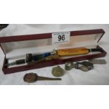 An interesting lot including cricket bat in tin with cap, seals etc.