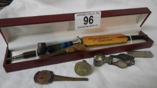 An interesting lot including cricket bat in tin with cap, seals etc.