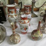5 assorted oriental vases.