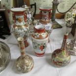 5 assorted oriental vases.