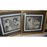 A pair of framed and glazed print depicting children.