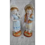 A pair of continental bisque porcelain figures, 10.5" tall.