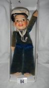 A vintage sailor doll in original costume, 10" tall and in good condition.