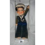 A vintage sailor doll in original costume, 10" tall and in good condition.