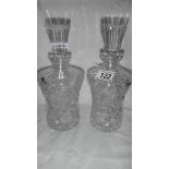 A pair of good quality cut glass decanters.