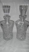 A pair of good quality cut glass decanters.