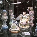 6 bisque porcelain figures.