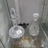 2 cut glass decanters.