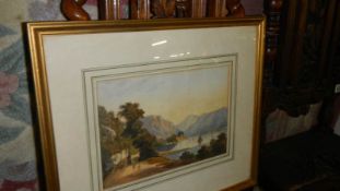 A framed and glazed watercolour depicting mountains signed S Campbell '46.