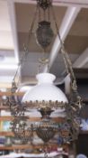 A hanging oil lamp.