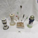 2 pottery hat pin stands, a sugar sifter with plated top and a quantity of hat pins in cushion.