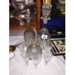 2 cut glass decanters, a scent bottle and 5 glasses.