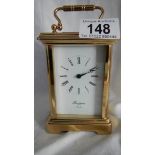 A good 20th century brass carriage clock with open glass top and sides by Rapport, London,